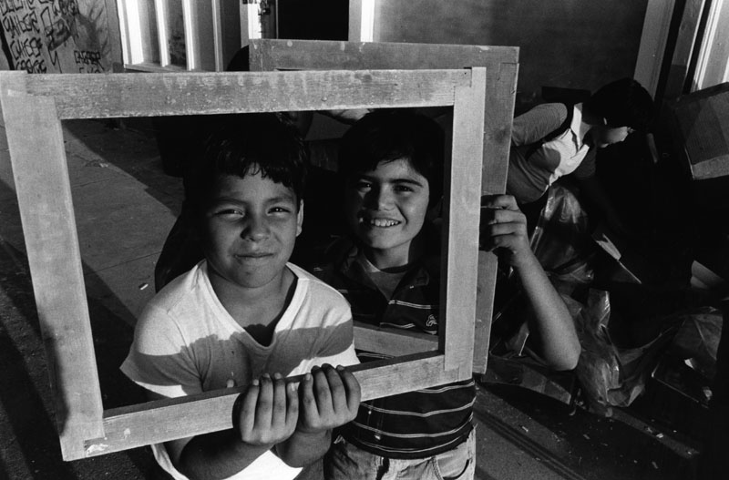 Boys posing along Echo Park Avenue, 1984. Photo by Gary Leonard. From the L.A. Neighborhoods Project sponsored by Photo Friends.